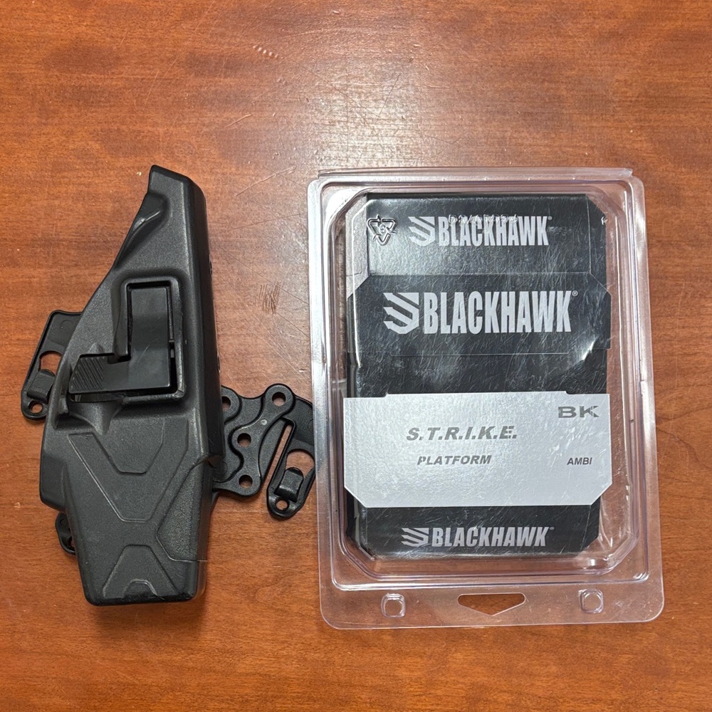 S.T.R.I.K.E. Ambidextrous Holster - Black w/ Axon mount for molle